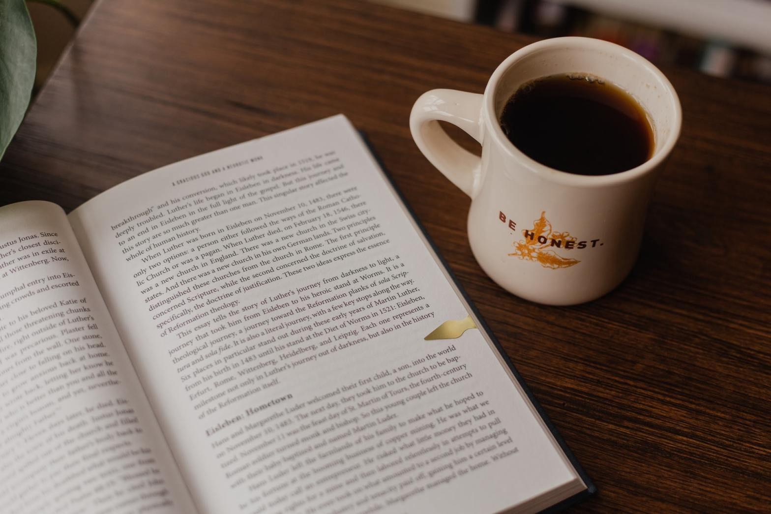 A book and a cup of coffee